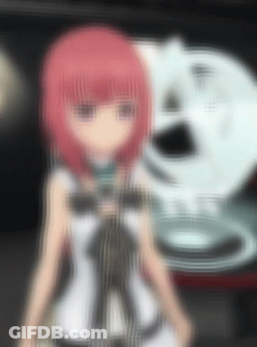 A Blurred Image Of A Girl With Red Hair GIF