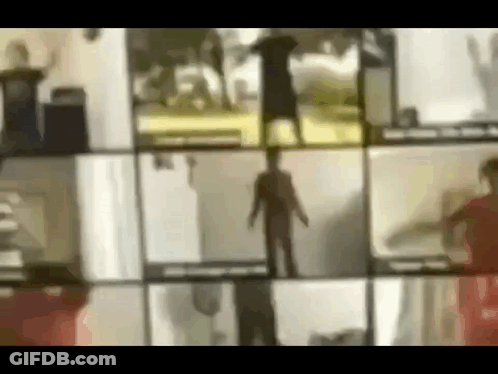 A Blurred Image Of A Group Of People Standing In Front Of A Window . GIF