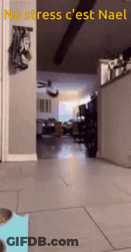 A Blurred Image Of A Hallway With The Words No Stress C'est Nael GIF