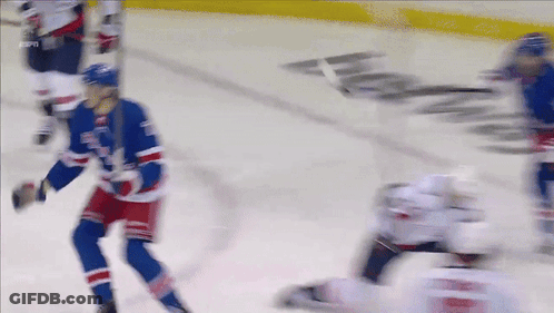 A Blurred Image Of A Hockey Game With Espn Written On The Ice GIF