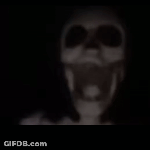 A Blurred Image Of A Lamp Hanging From The Ceiling . GIF