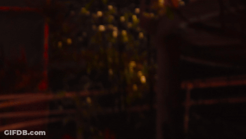 A Blurred Image Of A Light Coming Out Of A Glass GIF