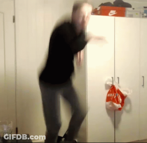 A Blurred Image Of A Man Dancing In Front Of A Nike Box GIF