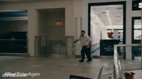 A Blurred Image Of A Man Running In A Mall With The Hashtag #Blartridesagain GIF