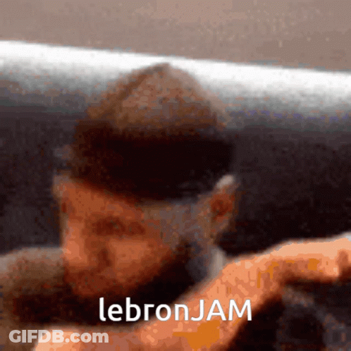 A Blurred Image Of A Man Wearing A Hat With The Word Lebron Jam Written On It GIF