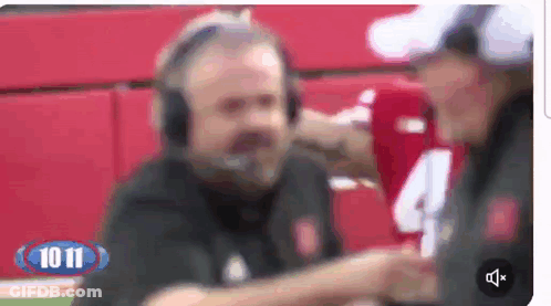 A Blurred Image Of A Man Wearing Headphones And A Number 4 Shirt GIF