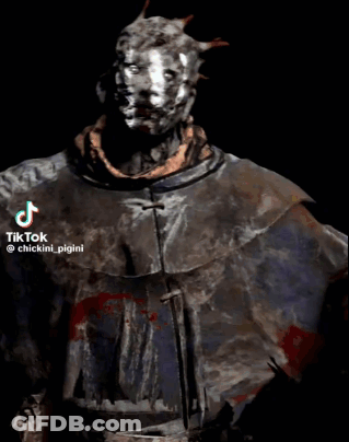 A Blurred Image Of A Man With A Mask On His Face . GIF