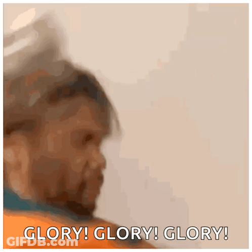 A Blurred Image Of A Man With The Words Glory Glory Glory GIF