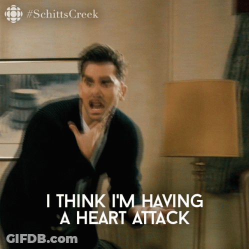 A Blurred Image Of A Man With The Words I Think I 'M Having A Heart Attack Below Him GIF
