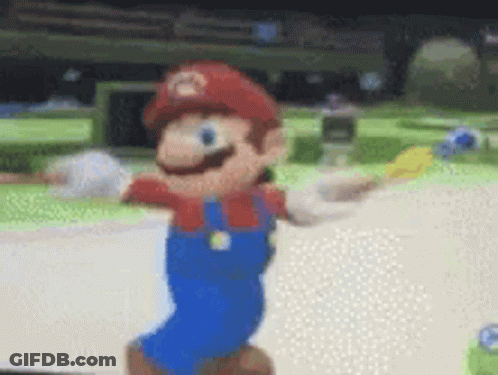 A Blurred Image Of A Mario Cartoon Character Dancing In A Video Game . GIF