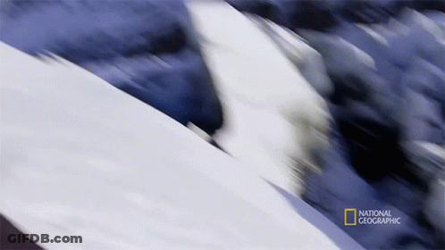 A Blurred Image Of A Mountain With The Words National Geographic In The Corner GIF