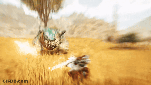 A Blurred Image Of A Person Fighting A Monster In A Field GIF