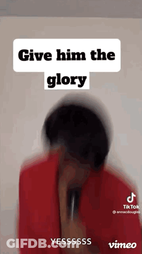 A Blurred Image Of A Person Holding A Microphone With The Words `` Give Him The Glory '' Written Above Them . GIF