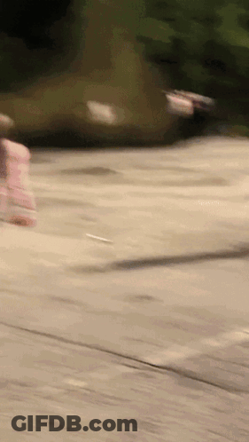 A Blurred Image Of A Person Riding A Skateboard GIF