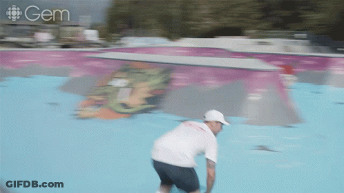 A Blurred Image Of A Person Riding A Skateboard With A Gem Logo Behind Them GIF