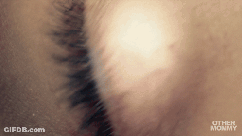 A Blurred Image Of A Person 'S Eye With The Words Other Mommy Below GIF
