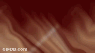 A Blurred Image Of A Person 'S Face On A Red Background GIF