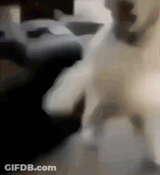 A Blurred Image Of A Person 'S Face With A Black Background GIF