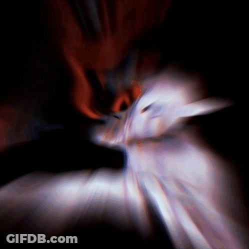 A Blurred Image Of A Person 'S Face With A Red Background GIF