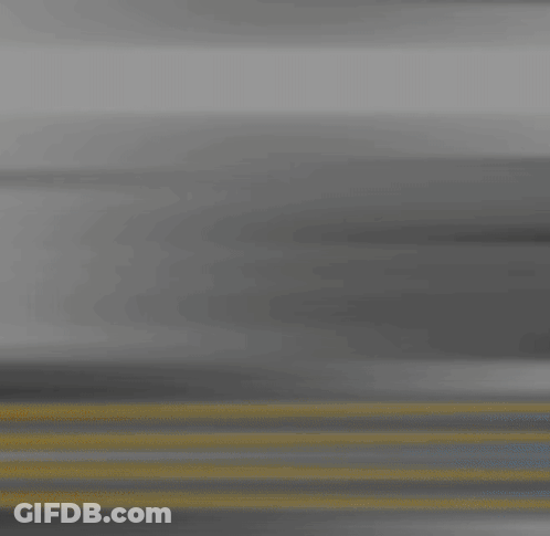 A Blurred Image Of A Person 'S Face With A Yellow Line Behind It GIF