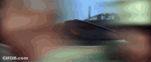 A Blurred Image Of A Person 'S Face With The Letters T And J Visible GIF