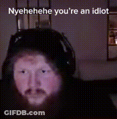 A Blurred Image Of A Person 'S Face With The Words Nyehehe You 'Re An Idiot Written Above It . GIF