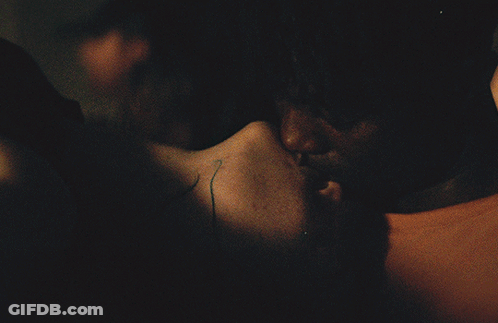 A Blurred Image Of A Person 'S Neck And Shoulder GIF