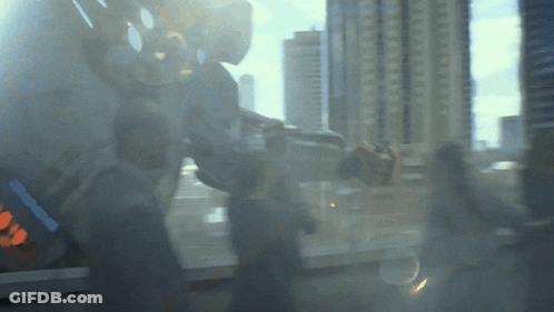 A Blurred Image Of A Person Standing In Front Of A Window GIF