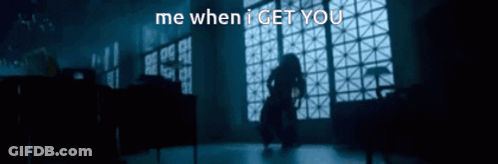 A Blurred Image Of A Person Standing In Front Of A Window With The Words Me When I Get You GIF