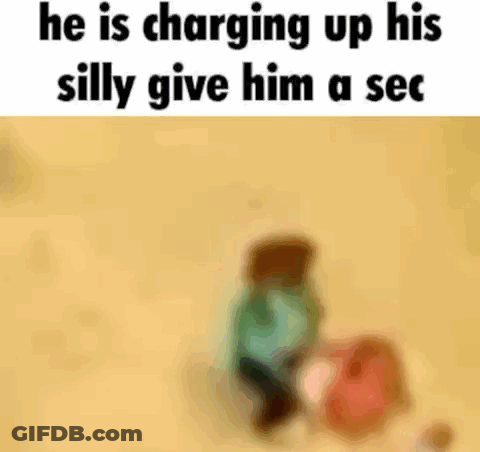 A Blurred Image Of A Person Standing Next To Another Person . GIF