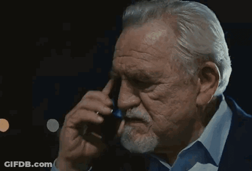 A Blurred Image Of A Person Walking Down A Street At Night GIF