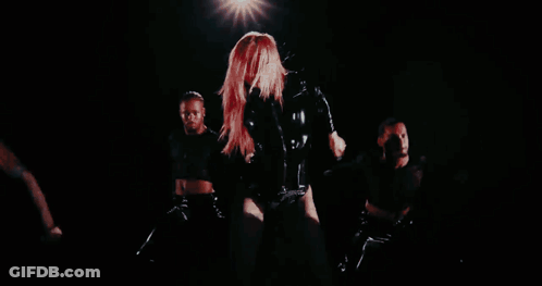 A Blurred Image Of A Person Walking In The Dark GIF