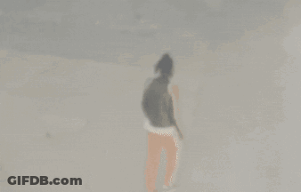 A Blurred Image Of A Person Walking On A Street GIF