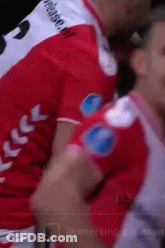 A Blurred Image Of A Person Wearing A Red Shirt With The Number 8 On The Back GIF