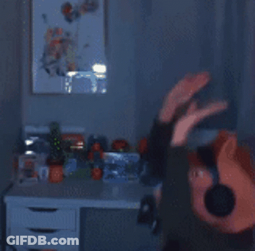 A Blurred Image Of A Person Wearing Headphones And A Pig Head GIF