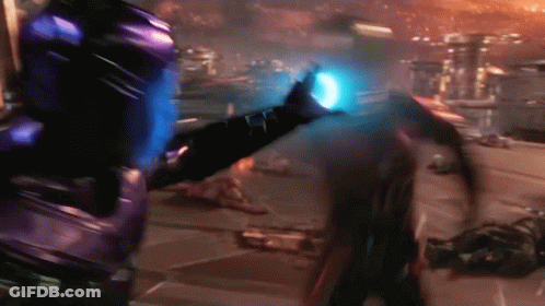 A Blurred Image Of A Person With A Blue Light Coming Out Of Their Chest GIF