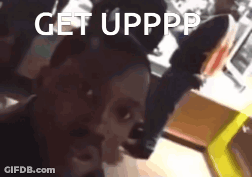A Blurred Image Of A Person With The Words Get Upppp Written On The Bottom GIF