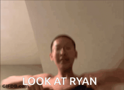 A Blurred Image Of A Person With The Words Look At Ryan Written Below Them GIF