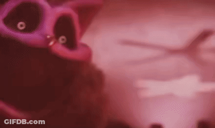 A Blurred Image Of A Pig With A Purple Head And A Purple Nose . GIF