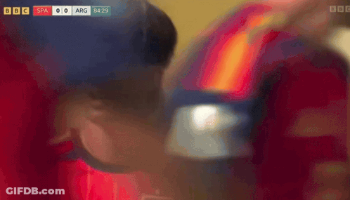 A Blurred Image Of A Red And Orange Background With A Bbc Logo GIF