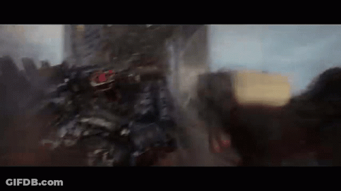 A Blurred Image Of A Robot Fighting A Monster In A Video Game . GIF