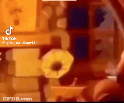 A Blurred Image Of A Room With A Tiktok Logo On Top GIF