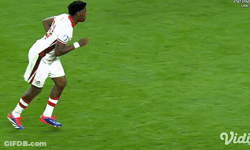 A Blurred Image Of A Soccer Field With The Words At & T Stad Usa On The Bottom Right GIF
