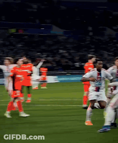 A Blurred Image Of A Soccer Game With A Player Wearing A Jersey That Says ' Lg ' On It GIF