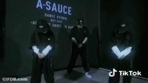 A Blurred Image Of A Stage With A Tiktok Logo GIF