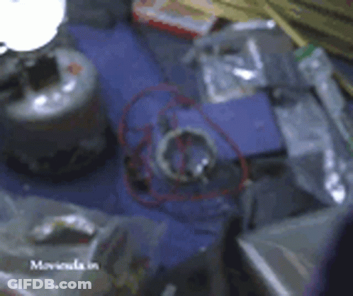 A Blurred Image Of A Table With The Word Moviola In The Bottom Right Corner GIF