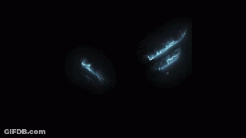 Blurred White Arrow On Blue Background GIF