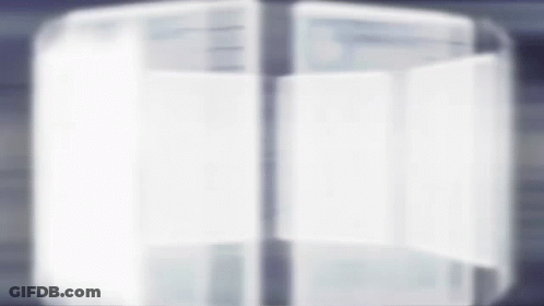 A Blurred Image Of A White Refrigerator With The Door Open GIF