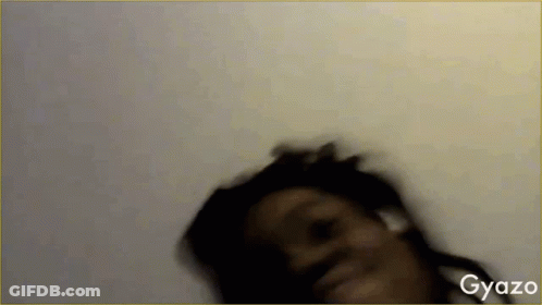 A Blurred Image Of A Woman With Gyazo Written On The Bottom Right Corner GIF