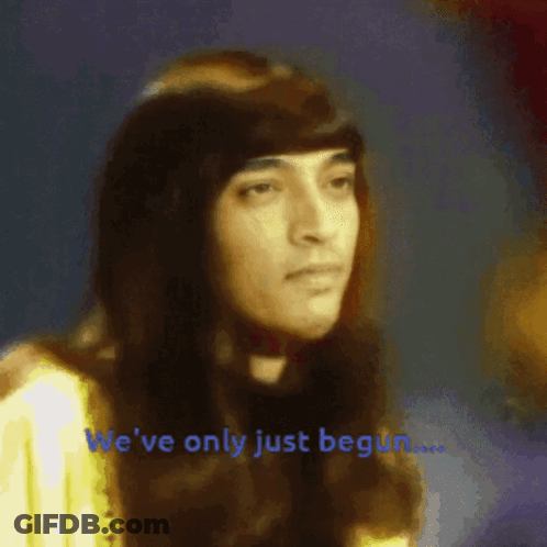 A Blurred Image Of A Woman With The Words We 'Ve Only Just Begun Below Her GIF